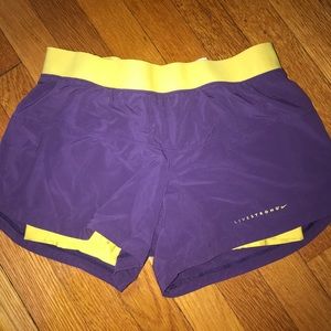 Nike Shorts. Drifting. Purple w Yellow spandex. S.